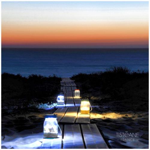 Luciole lampe solaire chemin de plage